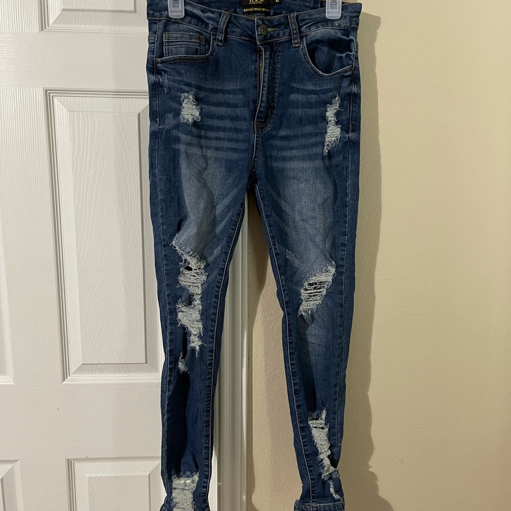Never worn - Distressed Skinny Jeans